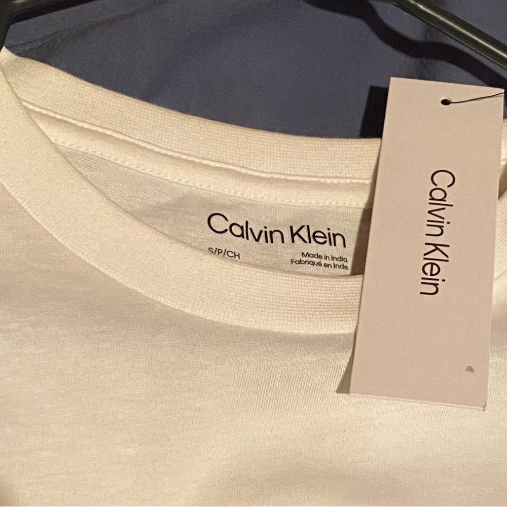 White Calvin Klein jeans tee with tags on